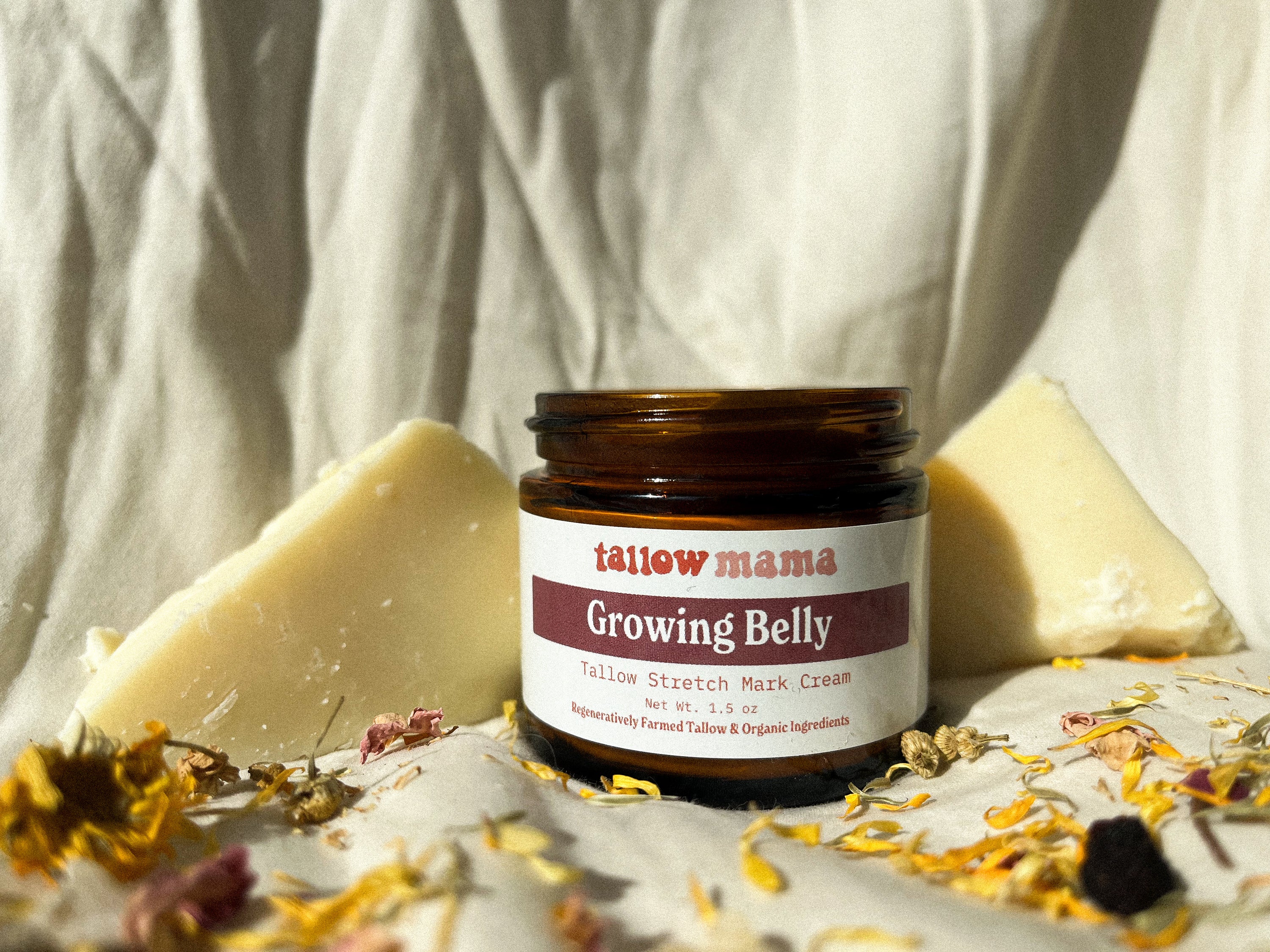 regeneratively raised unscented tallow balm in amber jar for mother who is pregnant or postpartum wanting to help belly grow and minimize stretch marks, herbal infused no essential oils