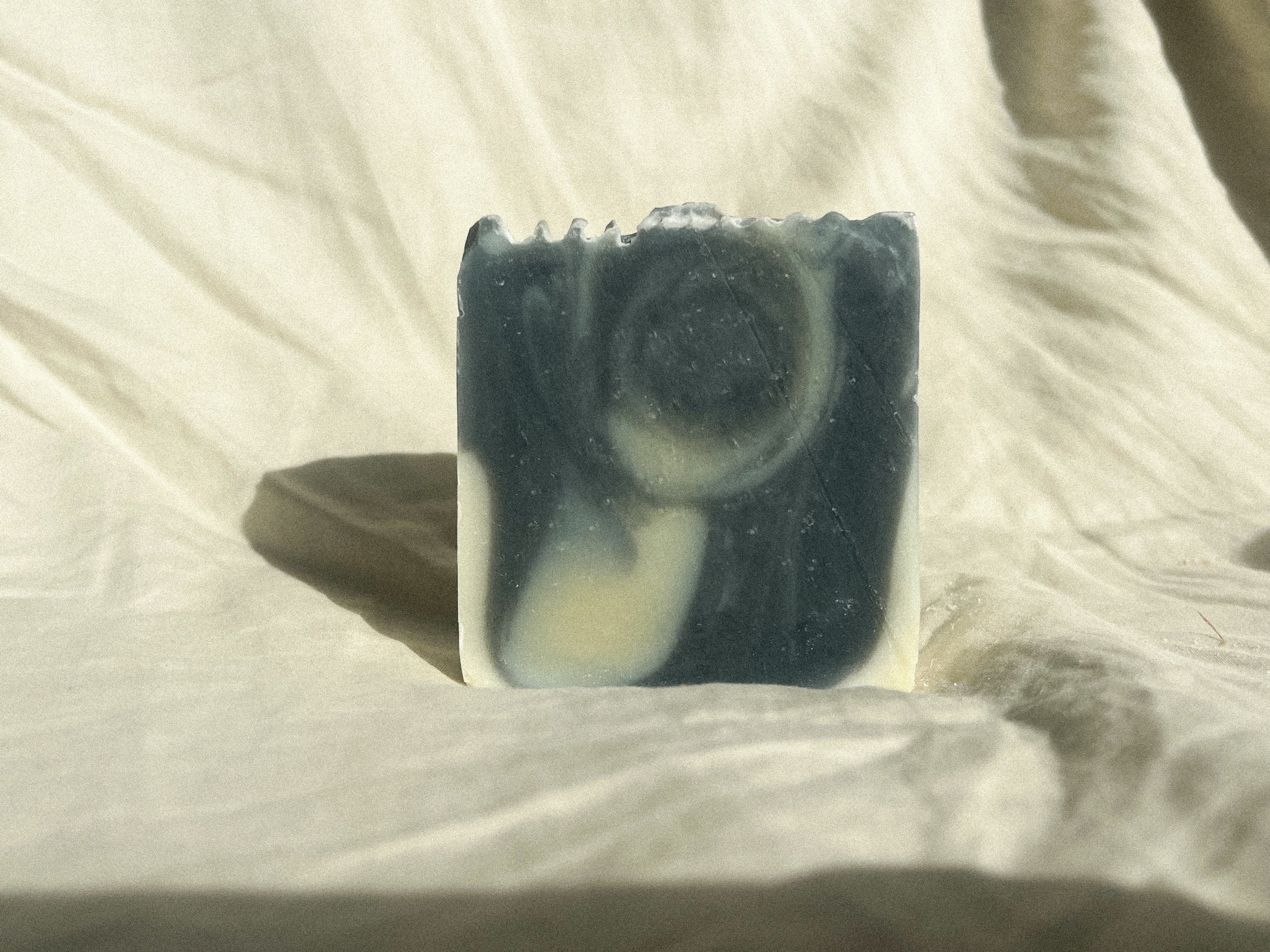 
regeneratively raised refreshing and clean scented tallow soap handcrafted for all ages and sensitive skin, all natural no synthetics, naturally colored with plants and clays, lemon eucalyptus and lemongrass