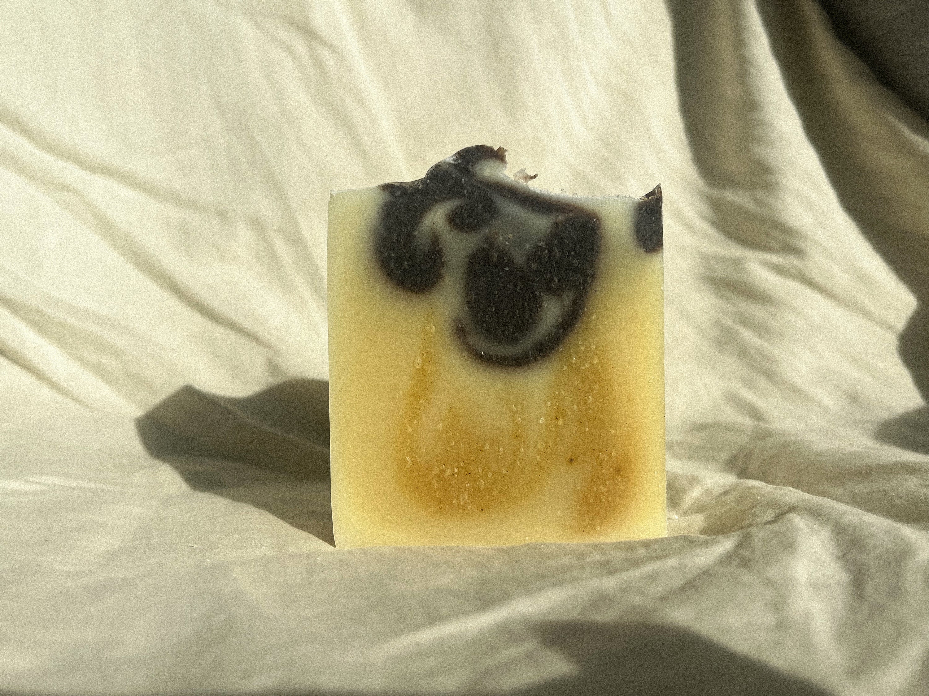 regeneratively raised refreshing and bright floral scented tallow soap handcrafted for all ages and sensitive skin, all natural no synthetics, naturally colored with plants and clays 
